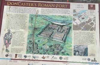 A sign with a map and text
Description automatically generated